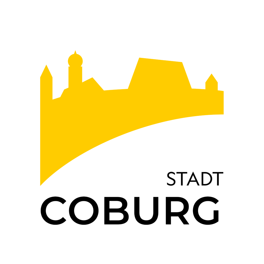 Logo der Stadt Coburg mit der Veste Coburg als gelbes Schema über dem Titel in schwarzen Großbuchstaben